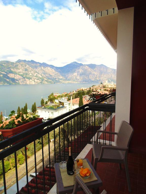 Double Room with Private External Bathroom, Balcony and Lake View,213595451:JPEG