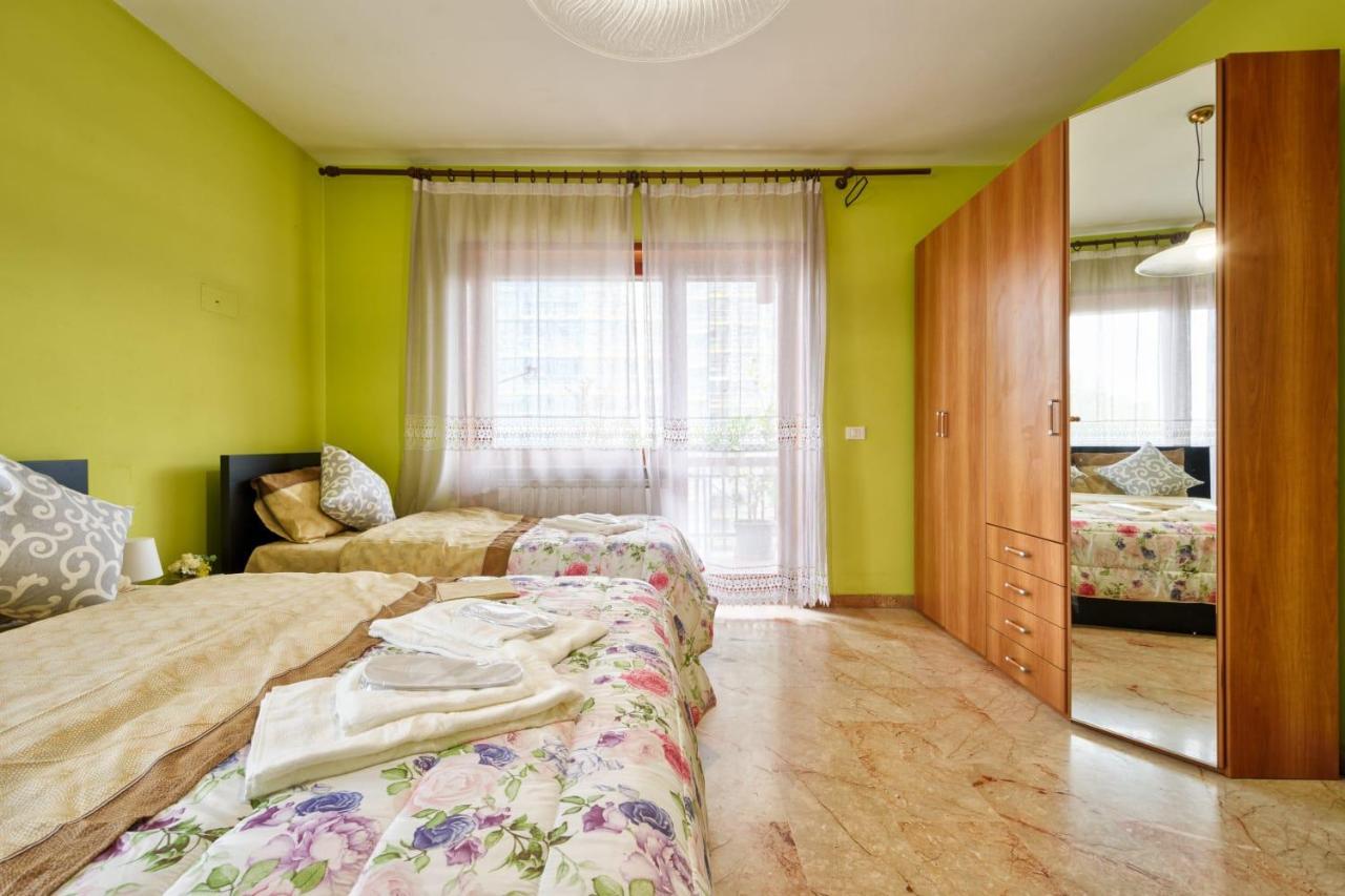 Camera Quadrupla con Bagno in Comune