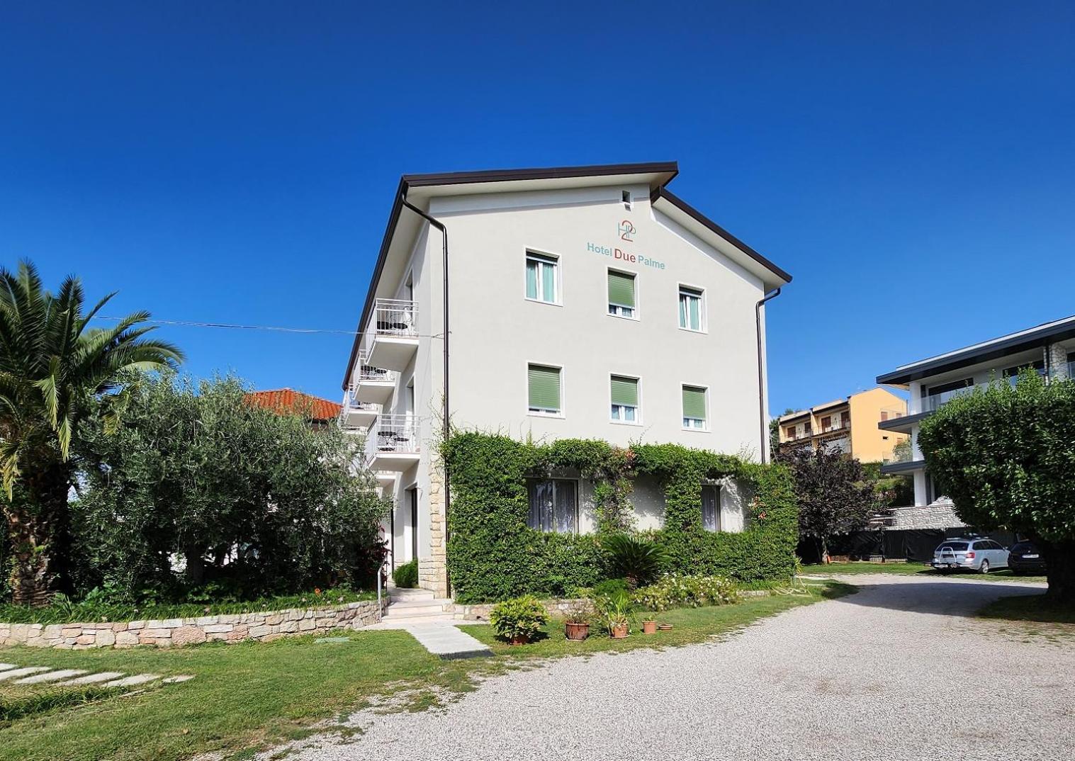 Camera Matrimoniale/Doppia con Letti Singoli con Balcone