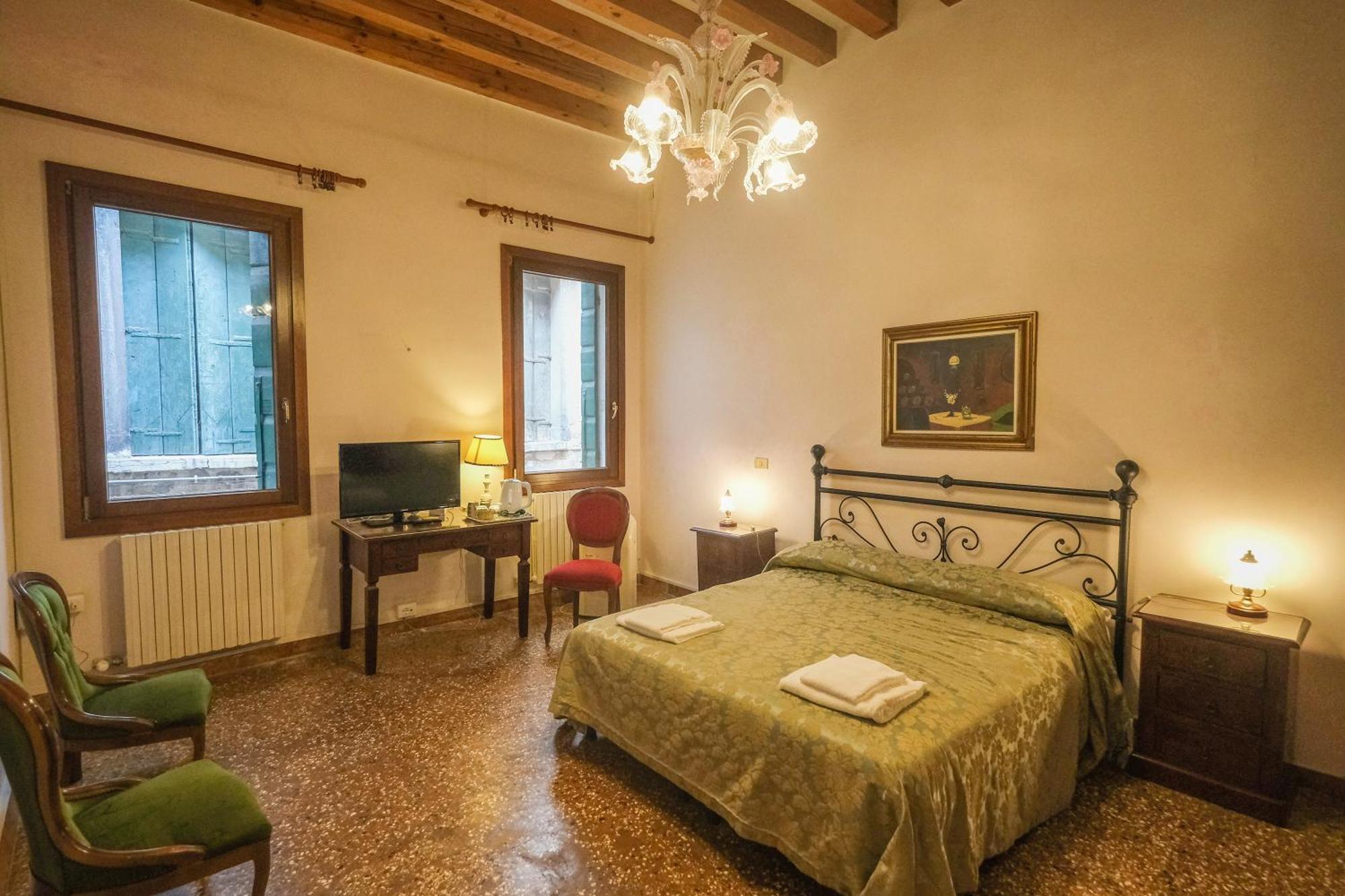 Quadruple Room with Private Bathroom