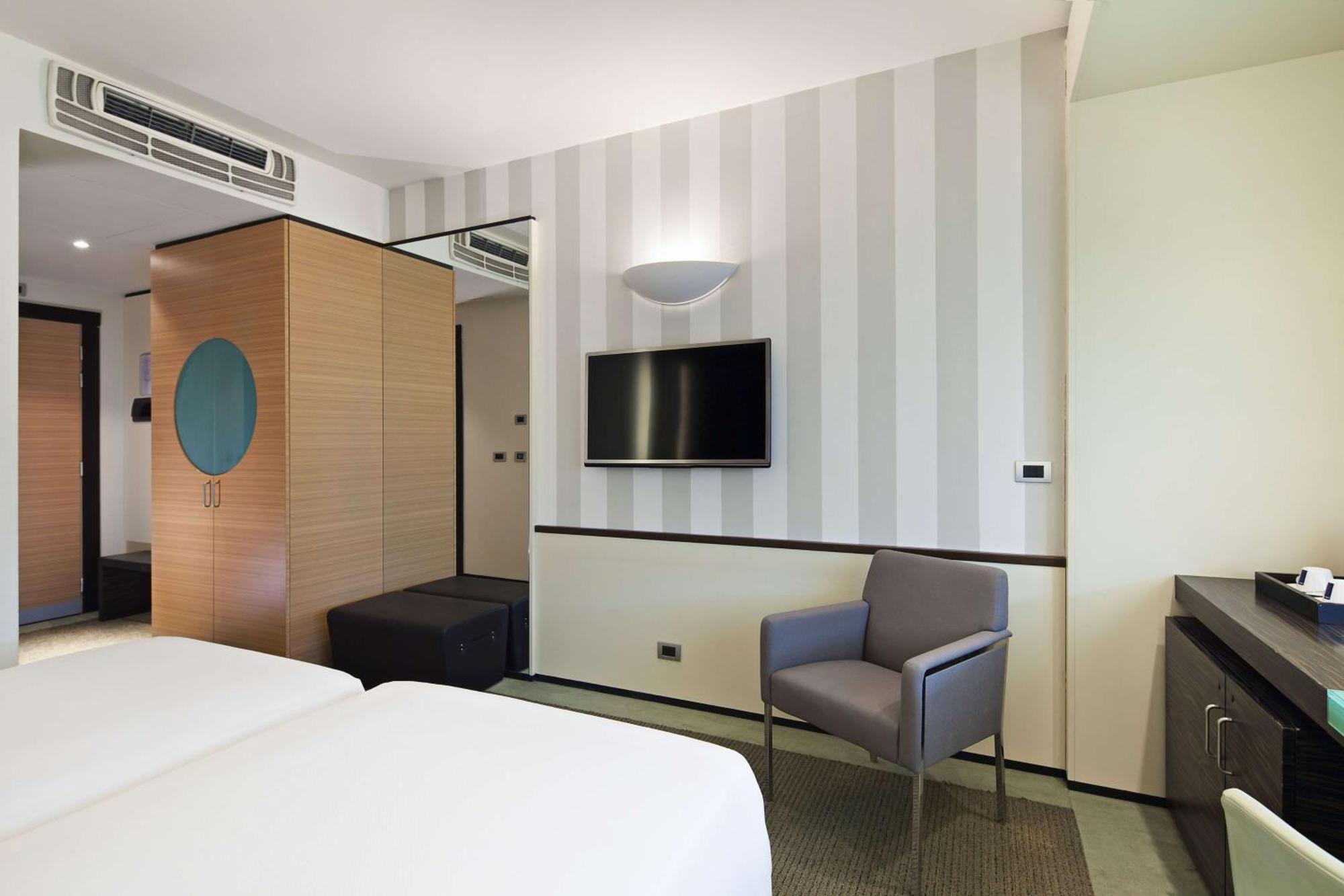 Family Connecting Room with Extra Bed (2 Adults + 3 Children)