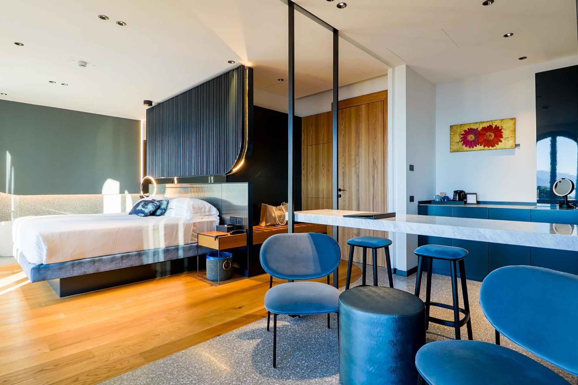 Suite mit Kingsize-Bett mit Terrasse und Seeblick – Nichtraucher