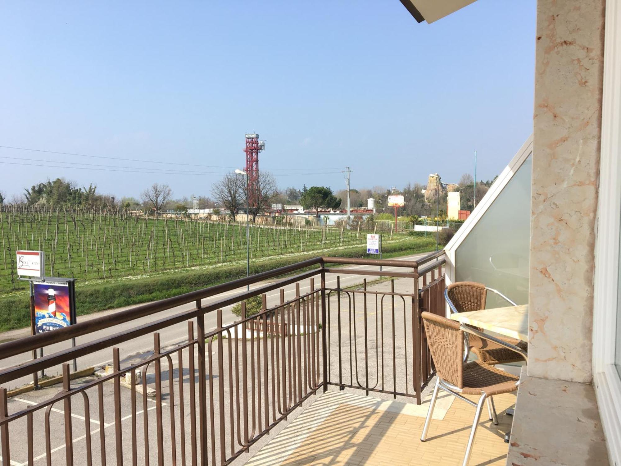 Triple Room Balcony Partial Lake View